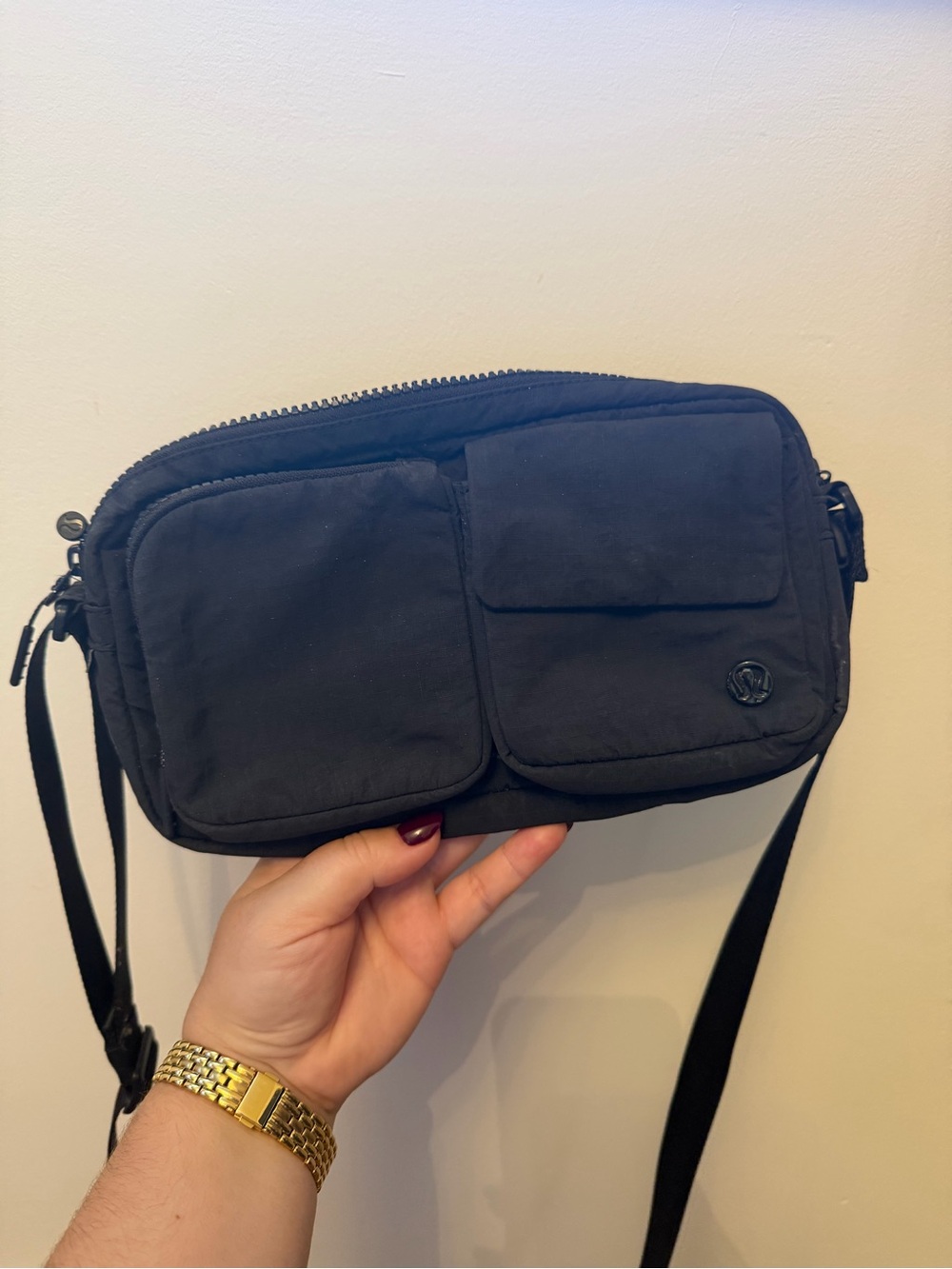Lululemon Multi-Pocket Black Crossbody Bag.